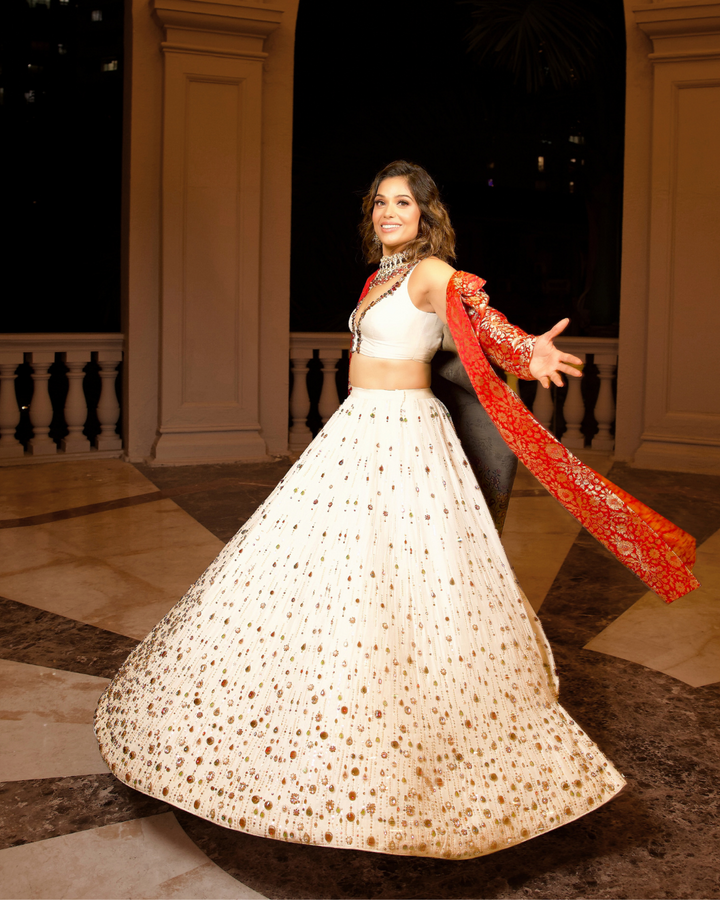 Ivory Lehenga with Multicolored Embellishment