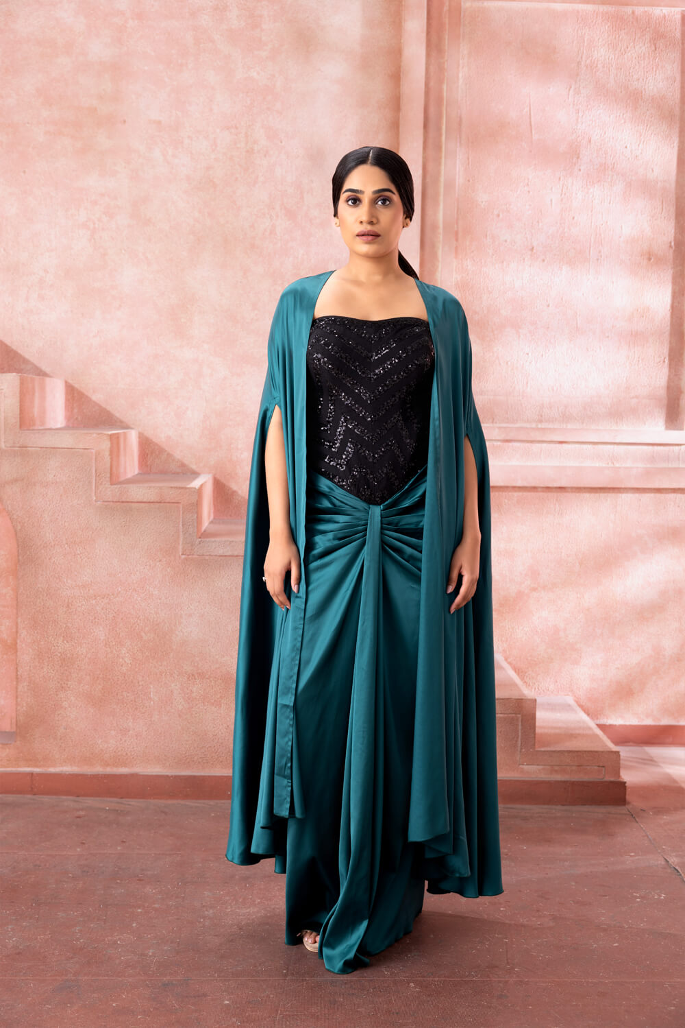 Samaira- Teal gown with cape - NSL FASHION PVT LTD